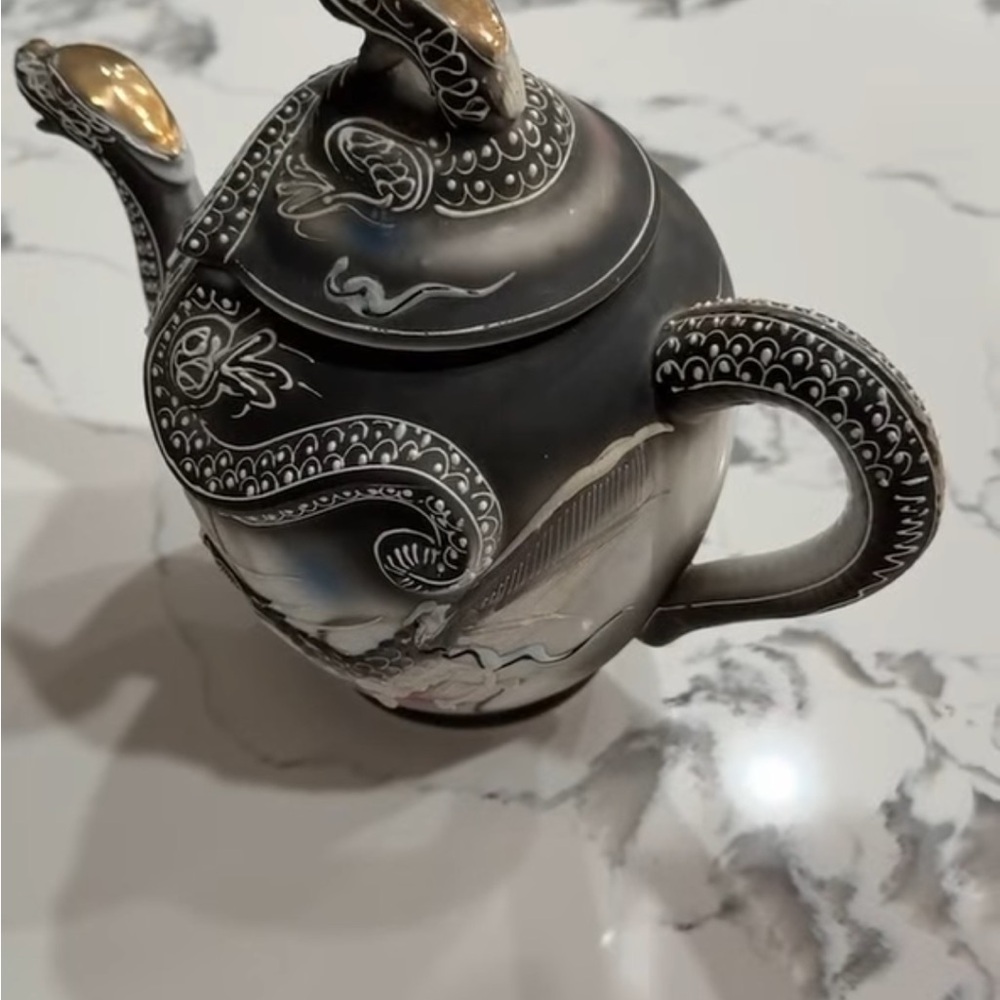 Black and Gold Teapot with Snake Design.